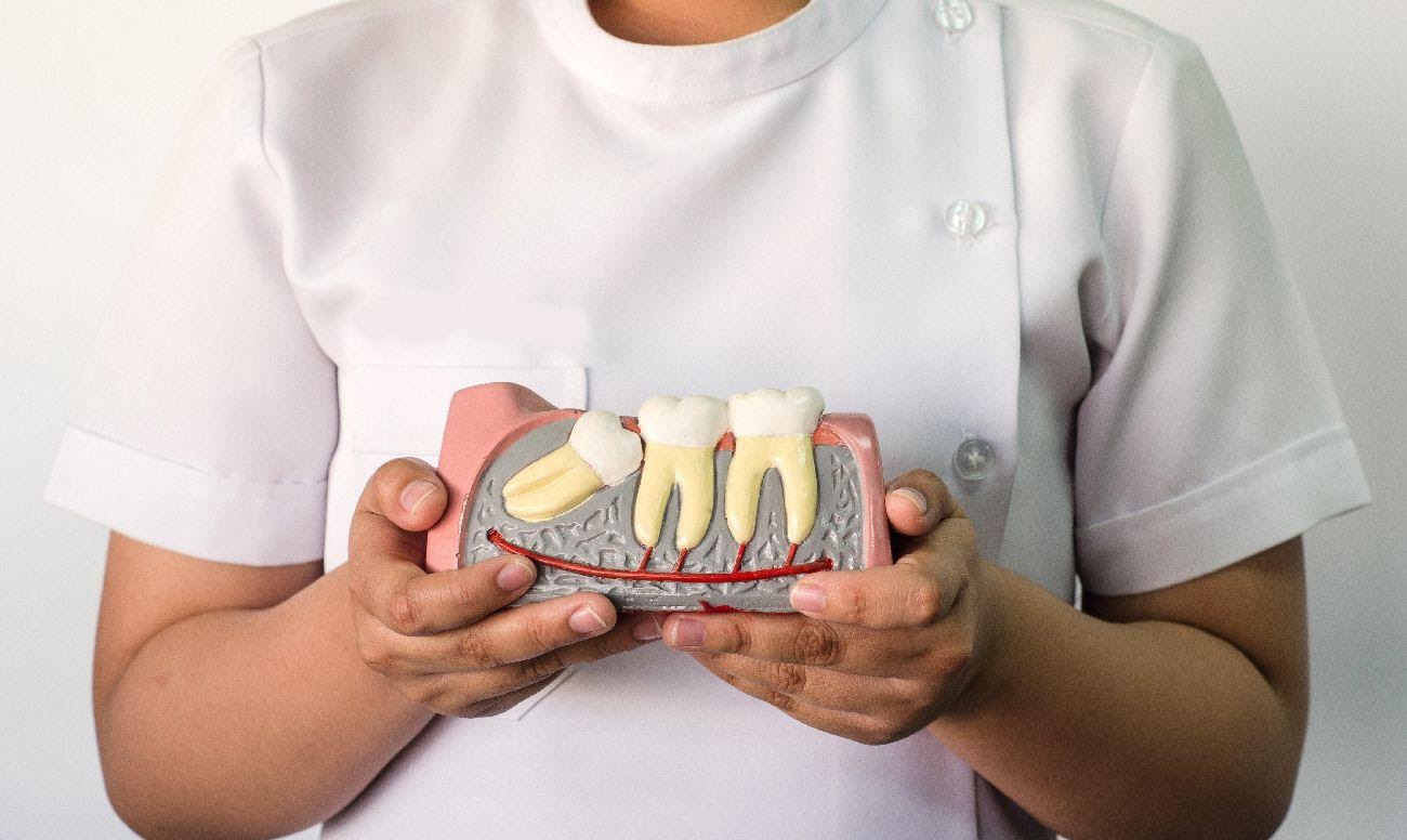 Чому болить зуб мудрості